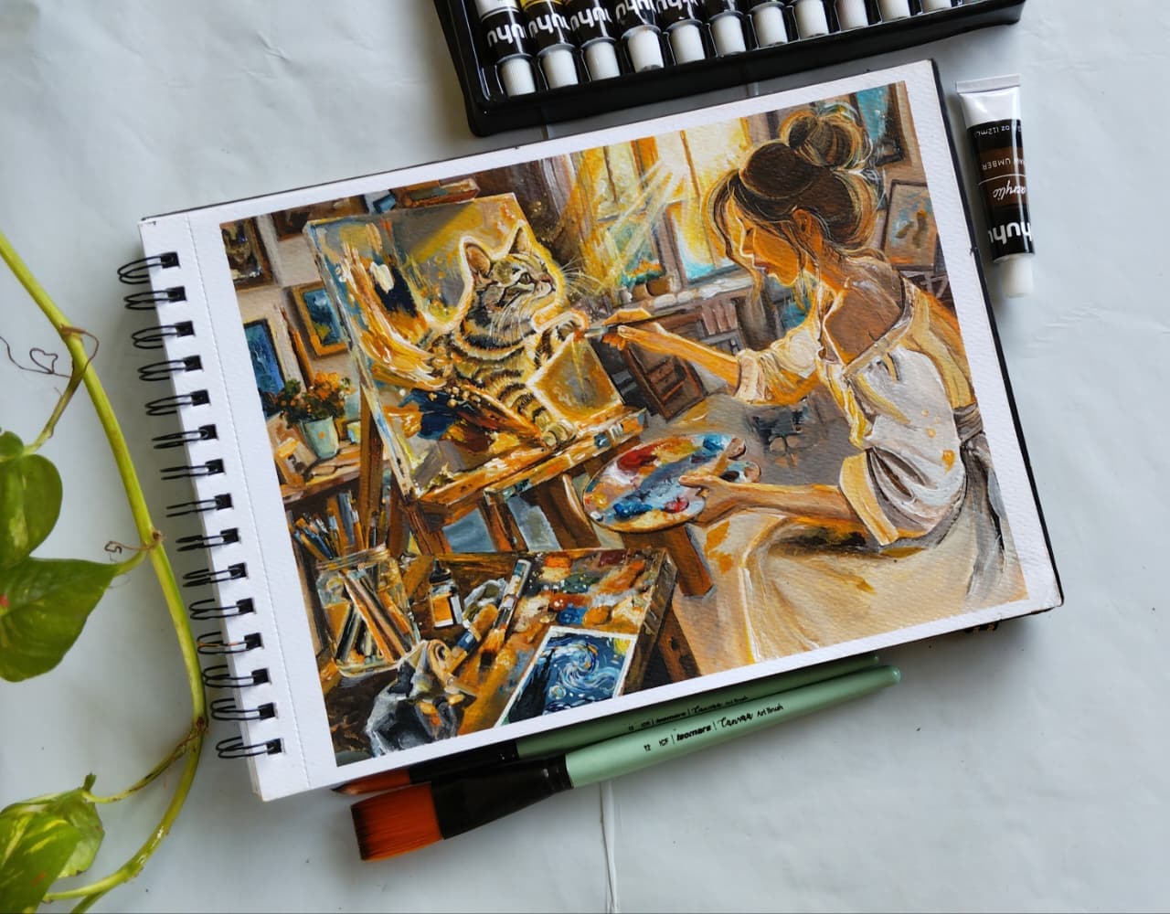Artist and cat painting together in a studio