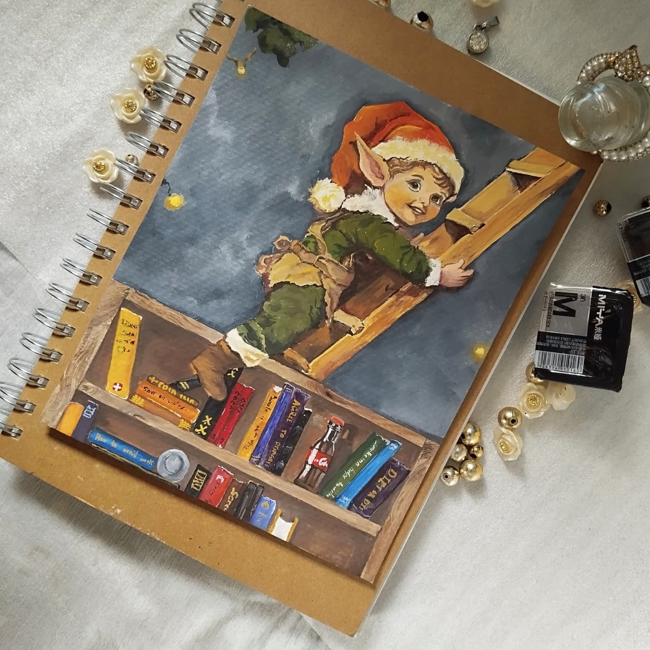 Painting of a Christmas elf sitting on a bookshelf