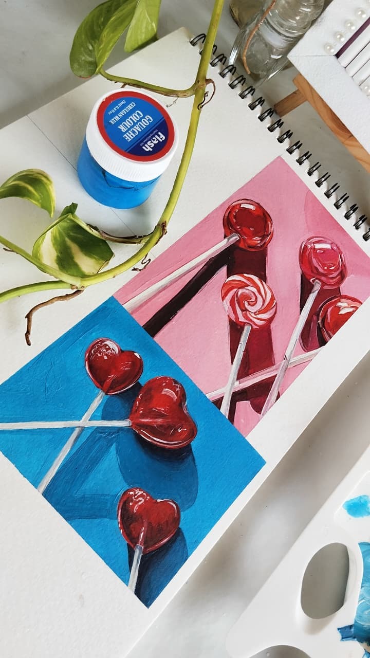 Painting of red lollipops
