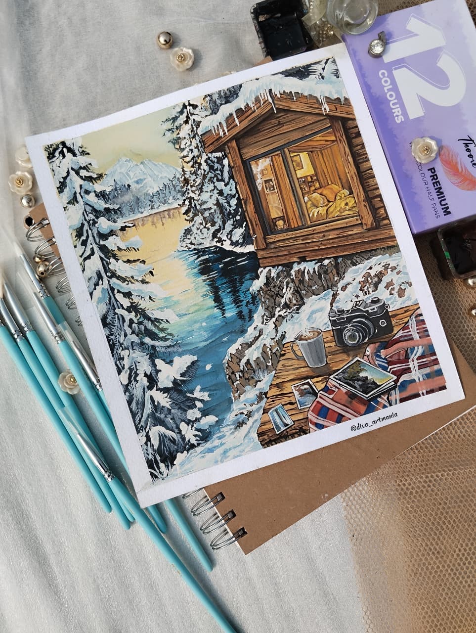 Painting of a snowy cabin beside a lake