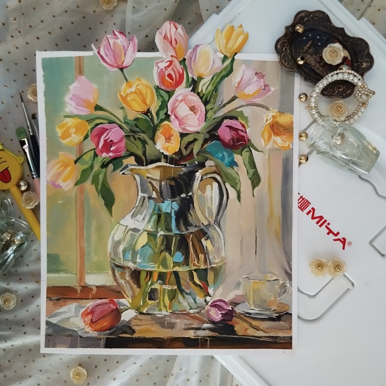 Painting of tulips in a silver vase